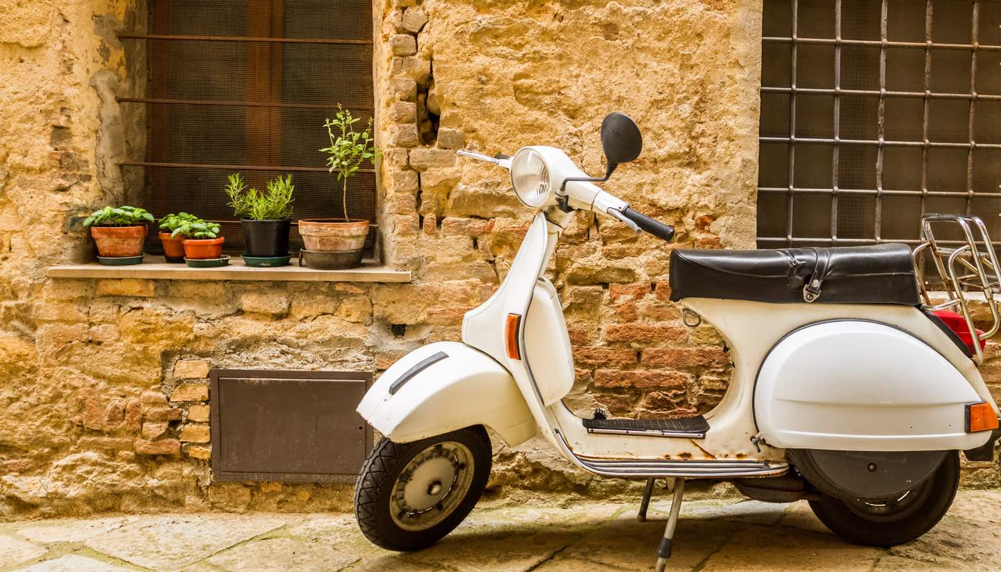 Italien - Vintage scene with Vespa on old street