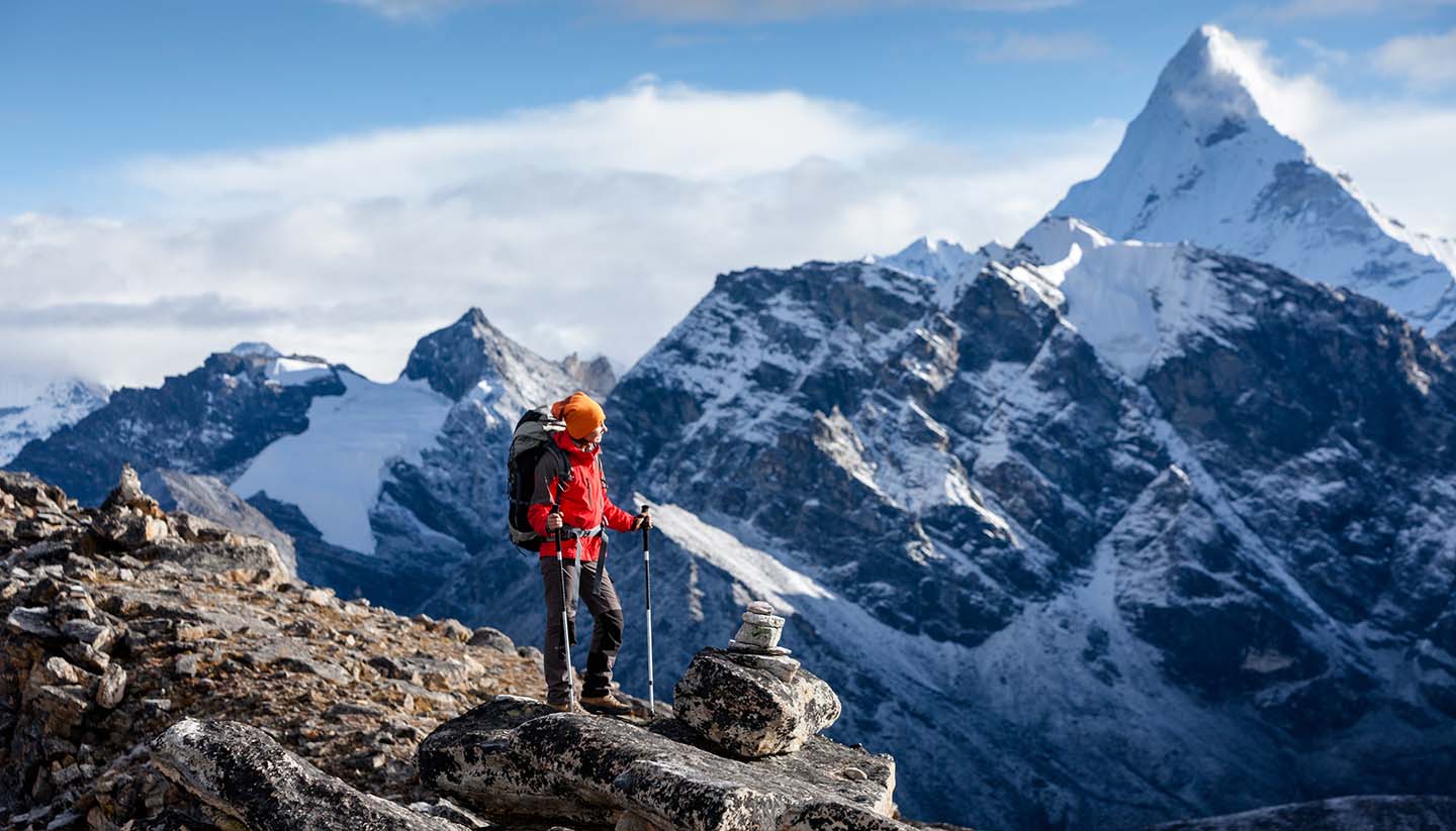 Nepal - Hiker posing at camera on the trek in Himalayas, Nepal