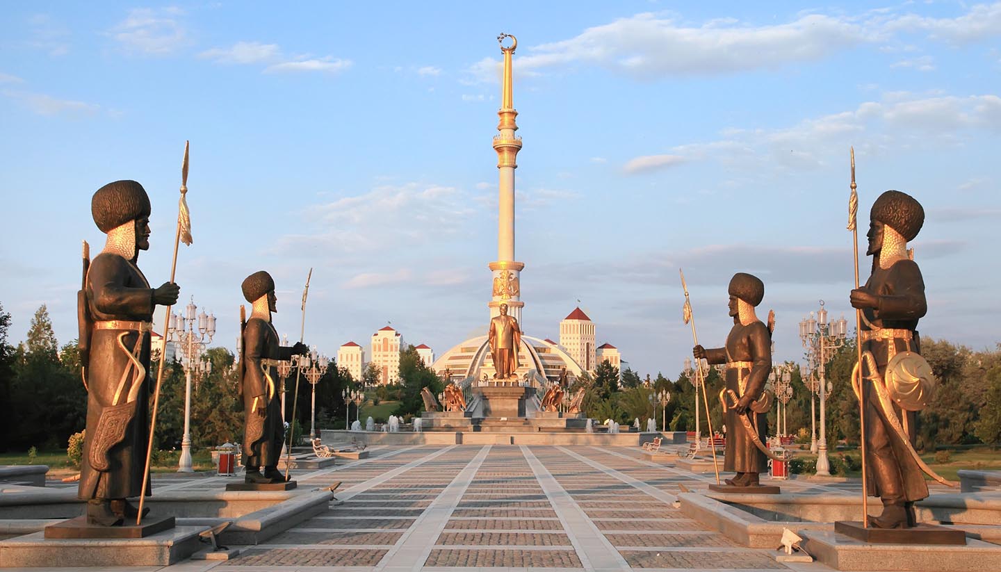 Turkmenistan - Monument Arch of Independence at sunset