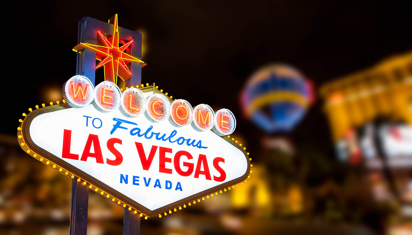 Nevada - Las vegas sign with strip street background